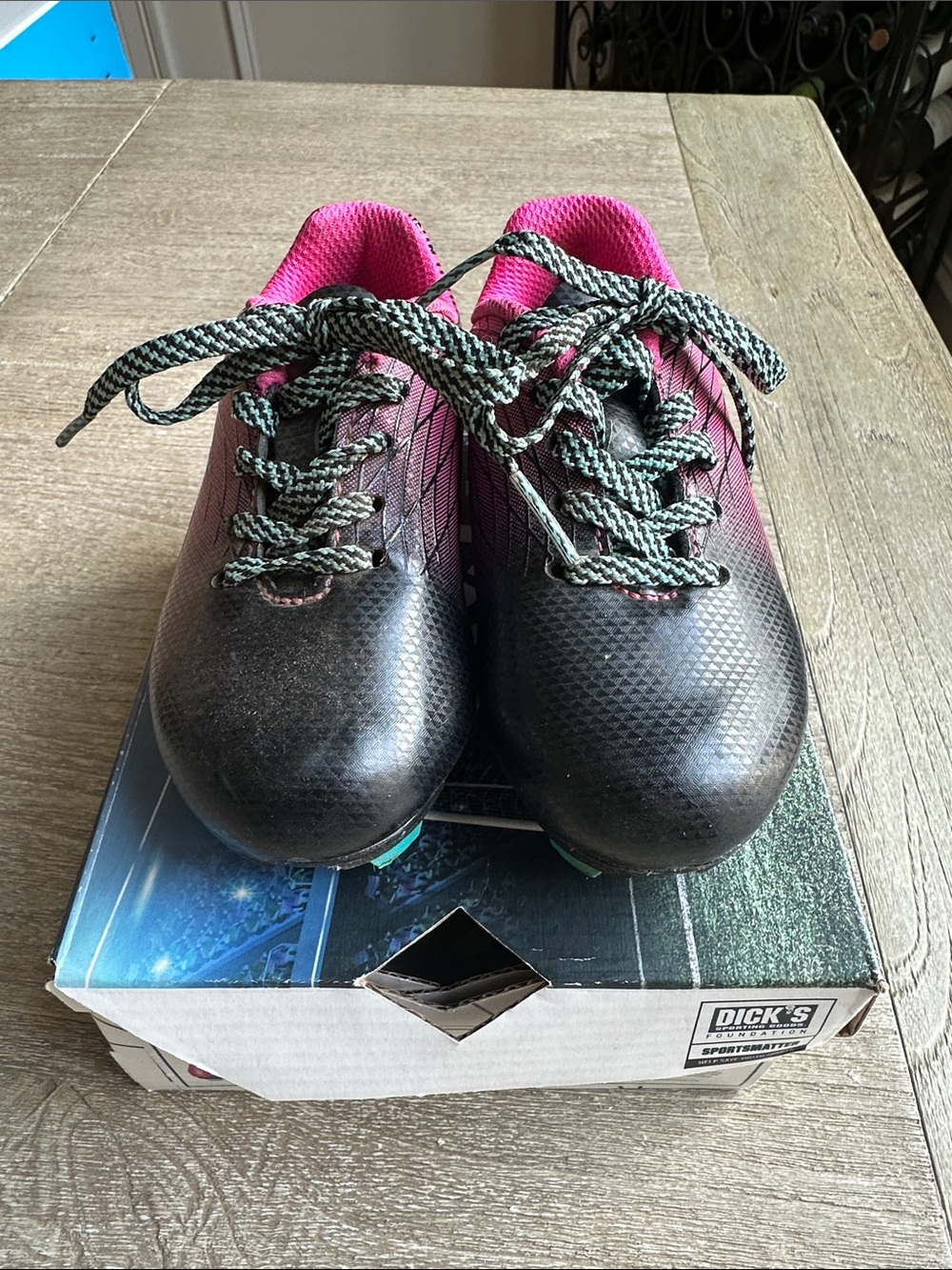 DSG Kids Black Soccer Cleats with Pink Lining and Green Laces